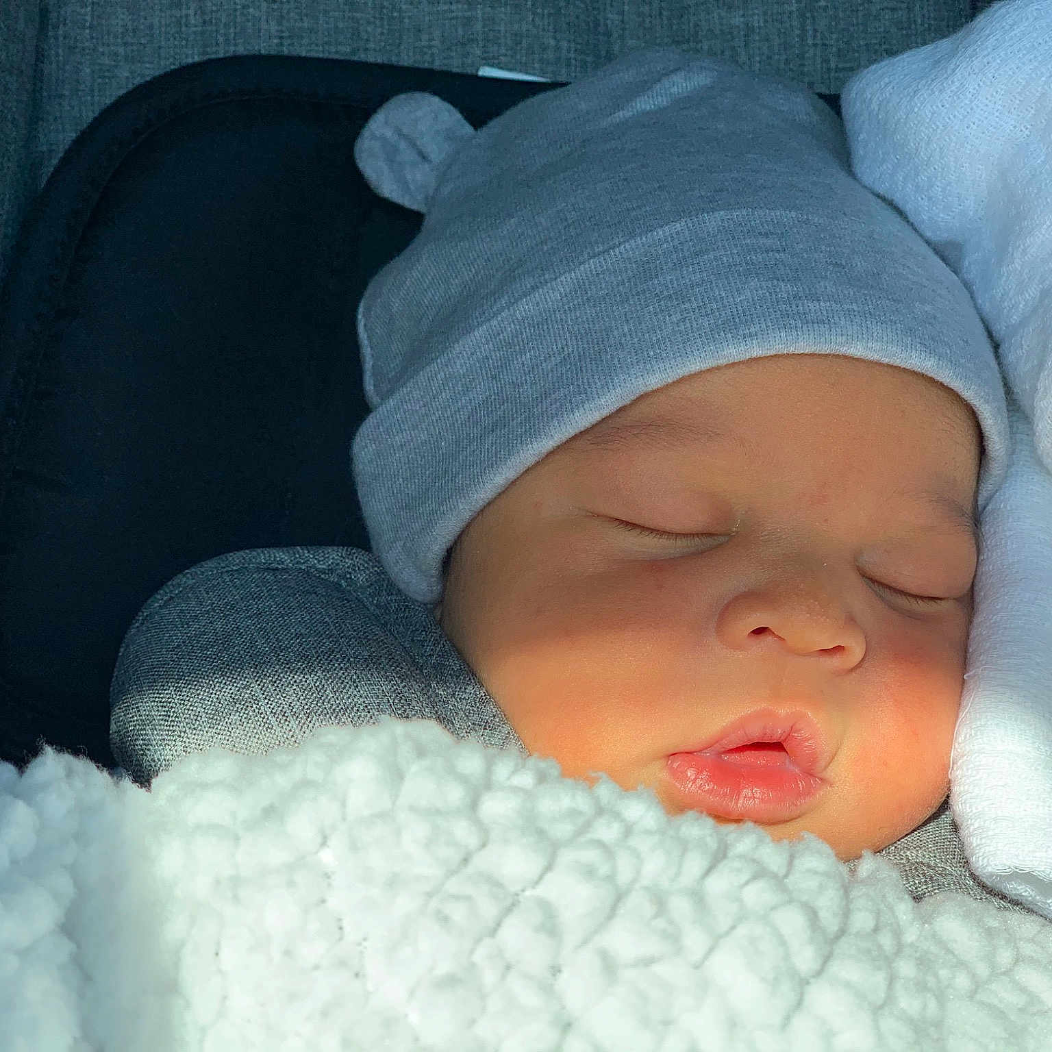 London is registered to the contest to win money with this photo: baby, baby_products, baby_sleeping, beauty, bedtime, birth, cheek, child, eye, hand, head, headgear, lip, mouth, nap, nose, skin, sleep, toddler, winter