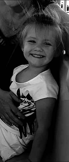 Lizzie is registered to the contest to win money with this photo: black_and_white, child, ear, eye, face, facial_expression, fun, happy, joy, laugh, lip, monochrome, monochrome_photography, mouth, person, photography, portrait, portrait_photography, smile, style