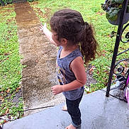 Rosalía joined the competition — help win amazing prizes! child, clothing, face, female, flagstone, garden, girl, grass, head, nature, outdoors, pants, path, person, photography, plant, portrait, sidewalk, slate, walkway