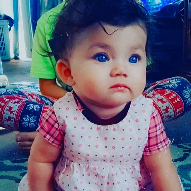 Nevaeh is registered to the contest to win money with this photo: baby_toddler_clothing, blue, cheek, chin, ear, eye, eyelash, facial_expression, finger, forehead, hairstyle, happy, head, iris, lip, mammal, mouth, nose, person, skin