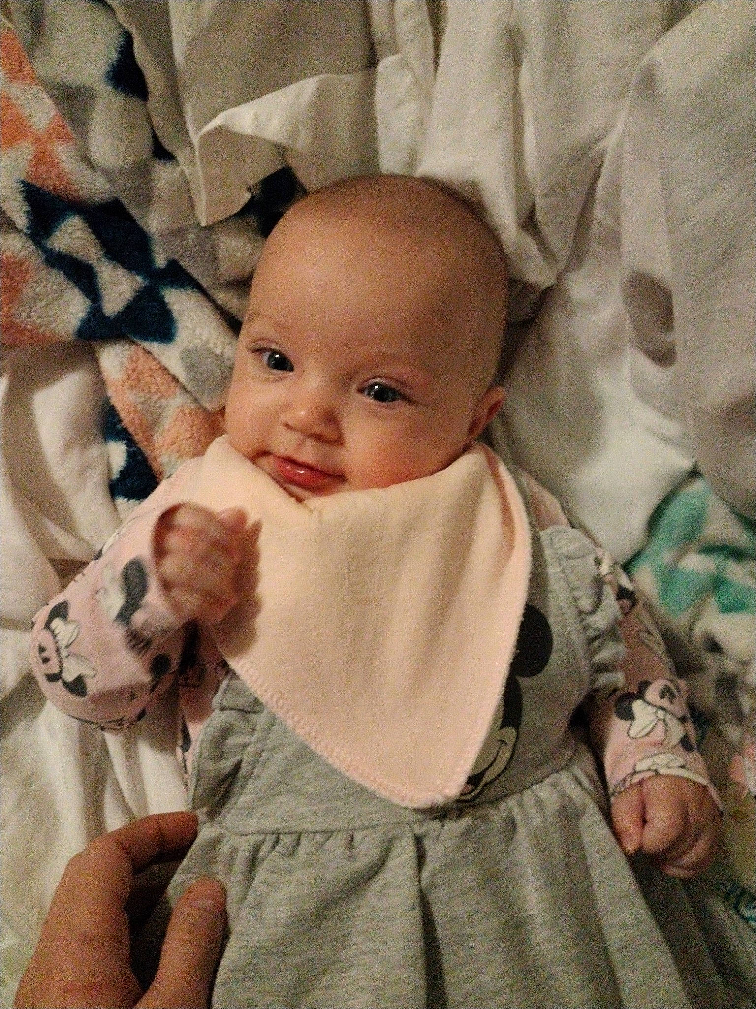 Jaxanne is registered to the contest to win money with this photo: baby, baby_products, baby_toddler_clothing, cheek, child, comfort, face, facial_expression, fashion_accessory, finger, gesture, happy, iris, linens, pattern, person, skin, sleeve, smile, thumb