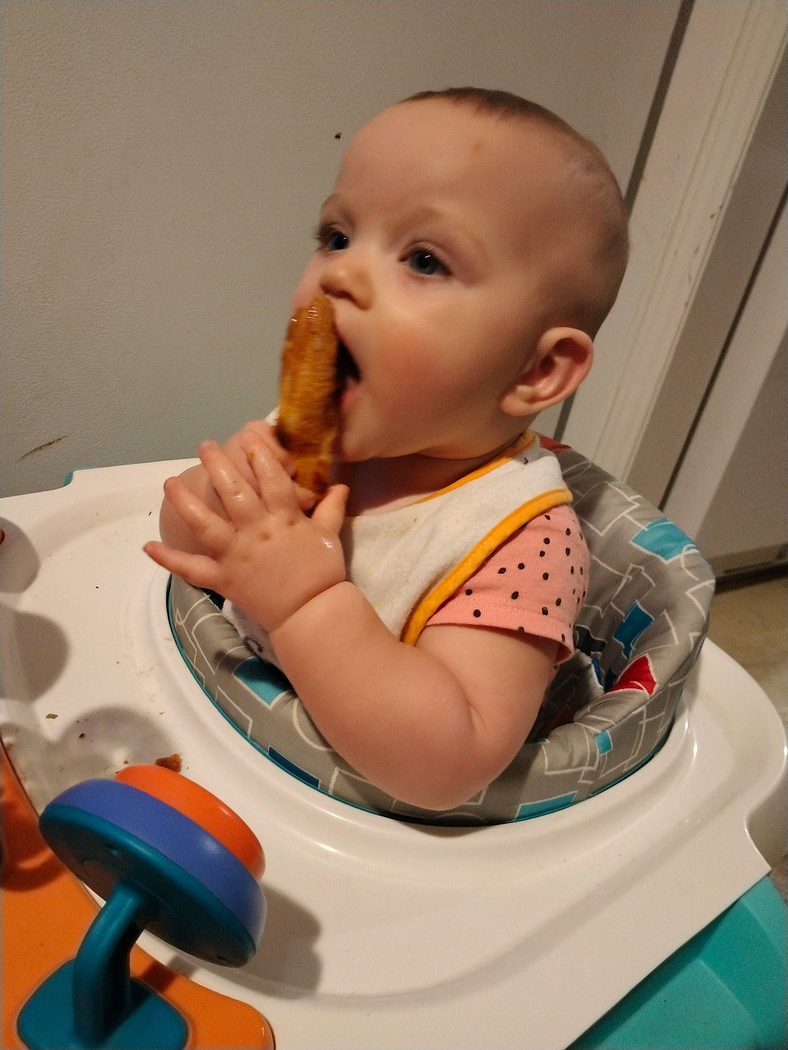 Jaxanne is registered to the contest to win money with this photo: arm, baby, baby_grabbing_for_something, baby_playing_with_toys, baby_products, baby_safety, baby_toddler_clothing, baby_toys, bib, cheek, child, comfort, finger, fun, mouth, person, play, room, sitting, thumb