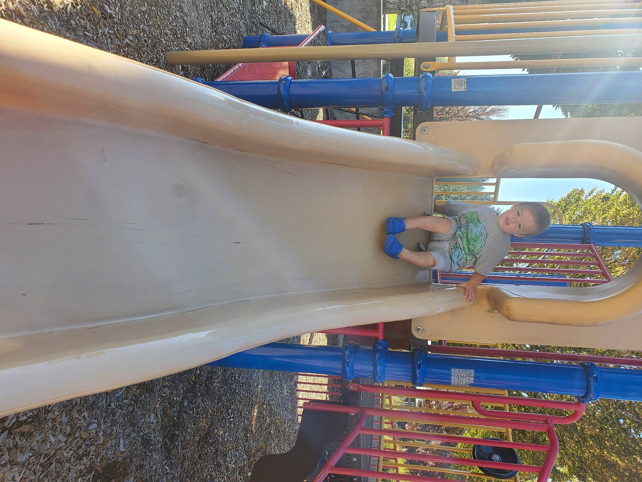 Micheal is registered to the contest to win money with this photo: art, chute, city, composite_material, electric_blue, engineering, fun, gas, leisure, machine, metal, musical_instrument, outdoor_play_equipment, person, pipe, plastic, playground, recreation, steel, water