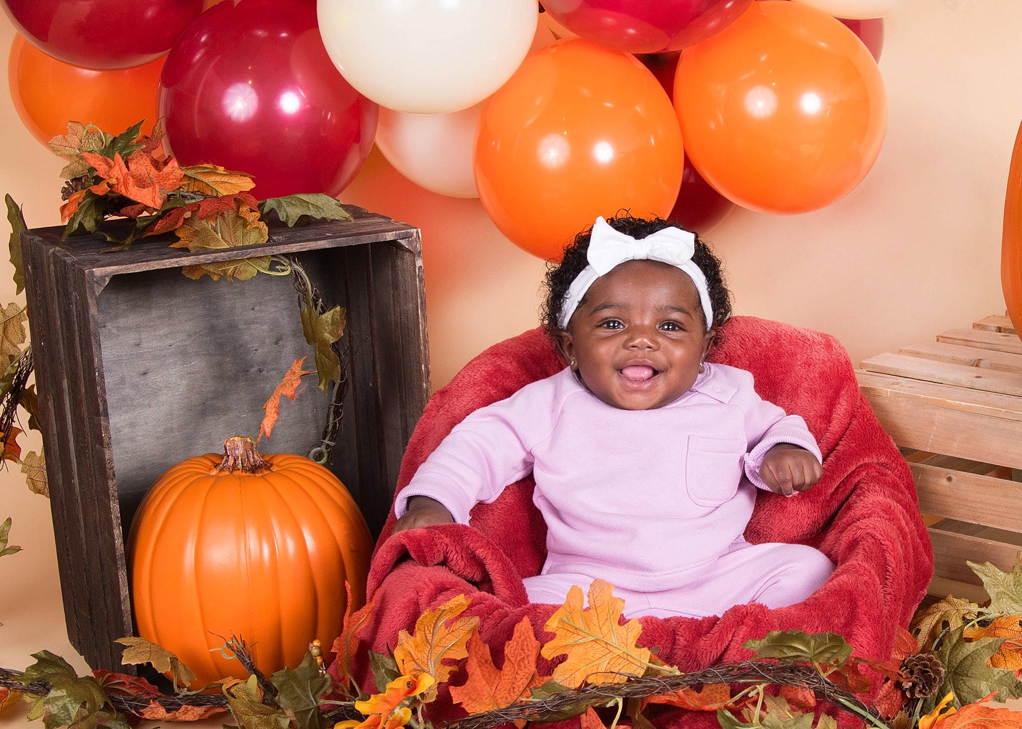 Kaliah joined the competition — help win amazing prizes! balloon, calabaza, cucurbita, facial_expression, gourd, green, happy, natural_foods, orange, organ, people, people_in_nature, person, photograph, plant, pumpkin, smile, squash, toddler, winter_squash