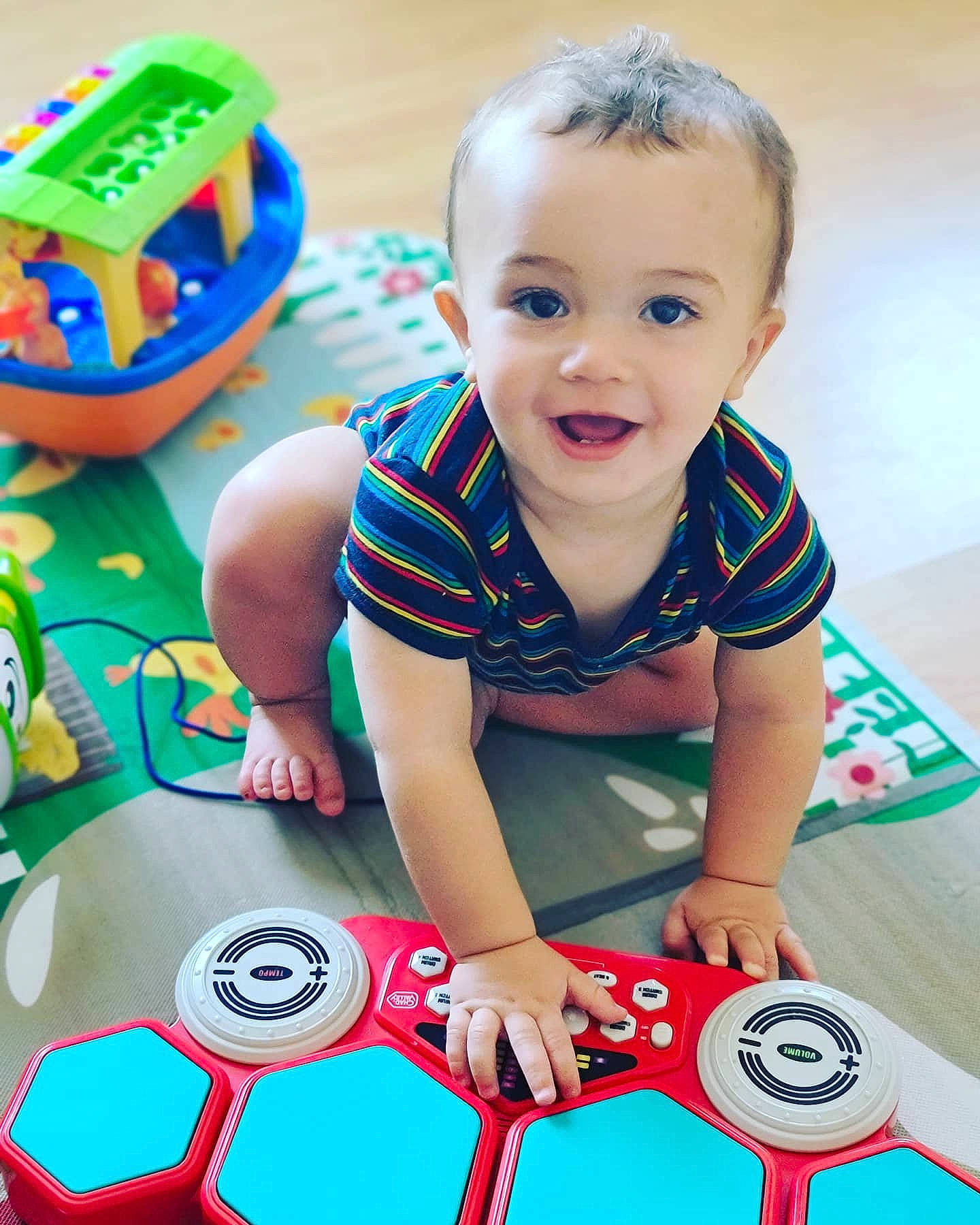 Jerome joined the competition — help win amazing prizes! baby, baby_playing_with_toys, baby_products, baby_toddler_clothing, baby_toys, child, fun, learning, musical_instrument, person, play, playset, product, smile, toddler, toy