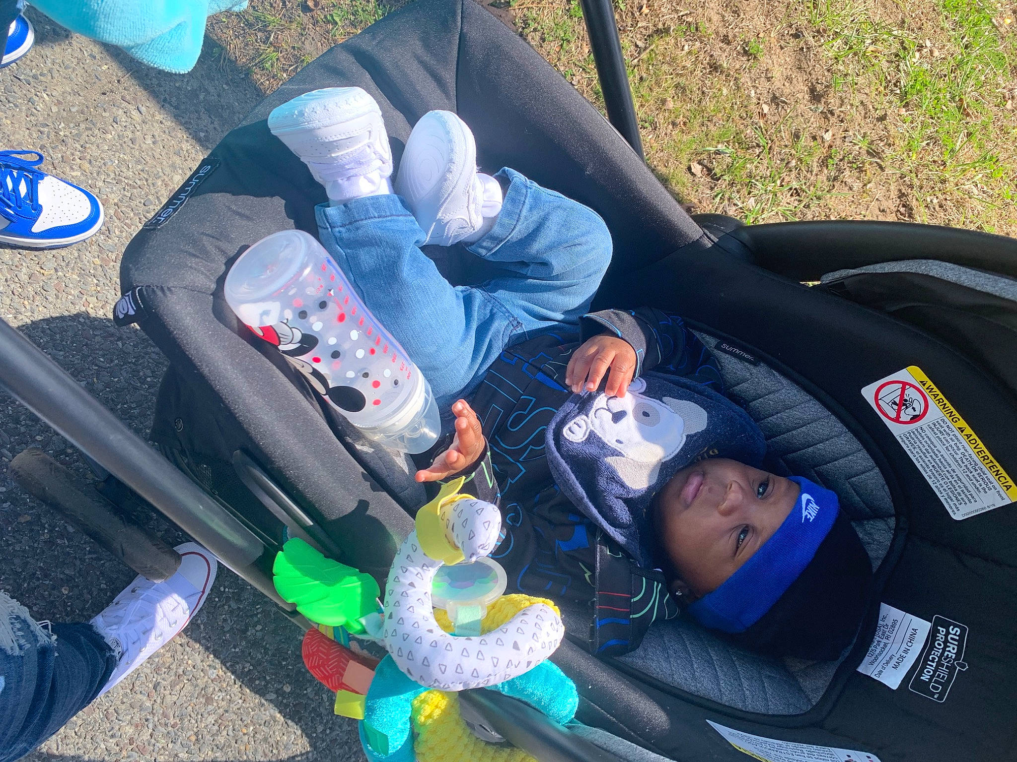 Jasahn joined the competition — help win amazing prizes! auto_part, baby, baby_carriage, baby_products, blue, car_seat, comfort, electric_blue, grass, hat, headwear, jeans, lap, person, recreation, sitting, sneakers, toddler, vehicle, walking_shoe