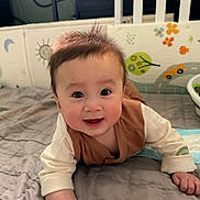 Richter Phan joined the competition — help win amazing prizes! baby, infant, child, smiling, happy, portrait, face, eyes, brown_hair, sitting, lying_down, bed, bedding, crib, nursery, indoors, clothing, long_sleeves, cozy, photography