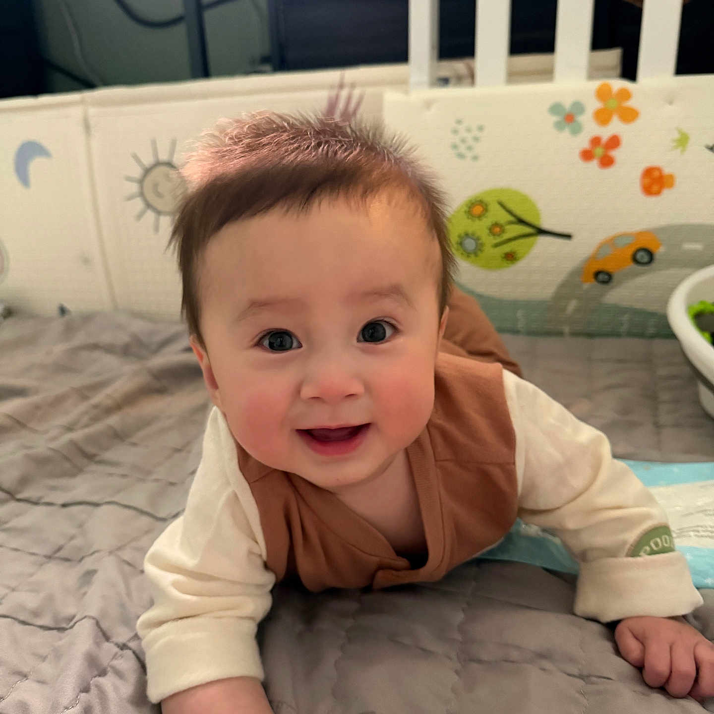 Richter Phan joined the competition — help win amazing prizes! baby, infant, child, smiling, happy, portrait, face, eyes, brown_hair, sitting, lying_down, bed, bedding, crib, nursery, indoors, clothing, long_sleeves, cozy, photography