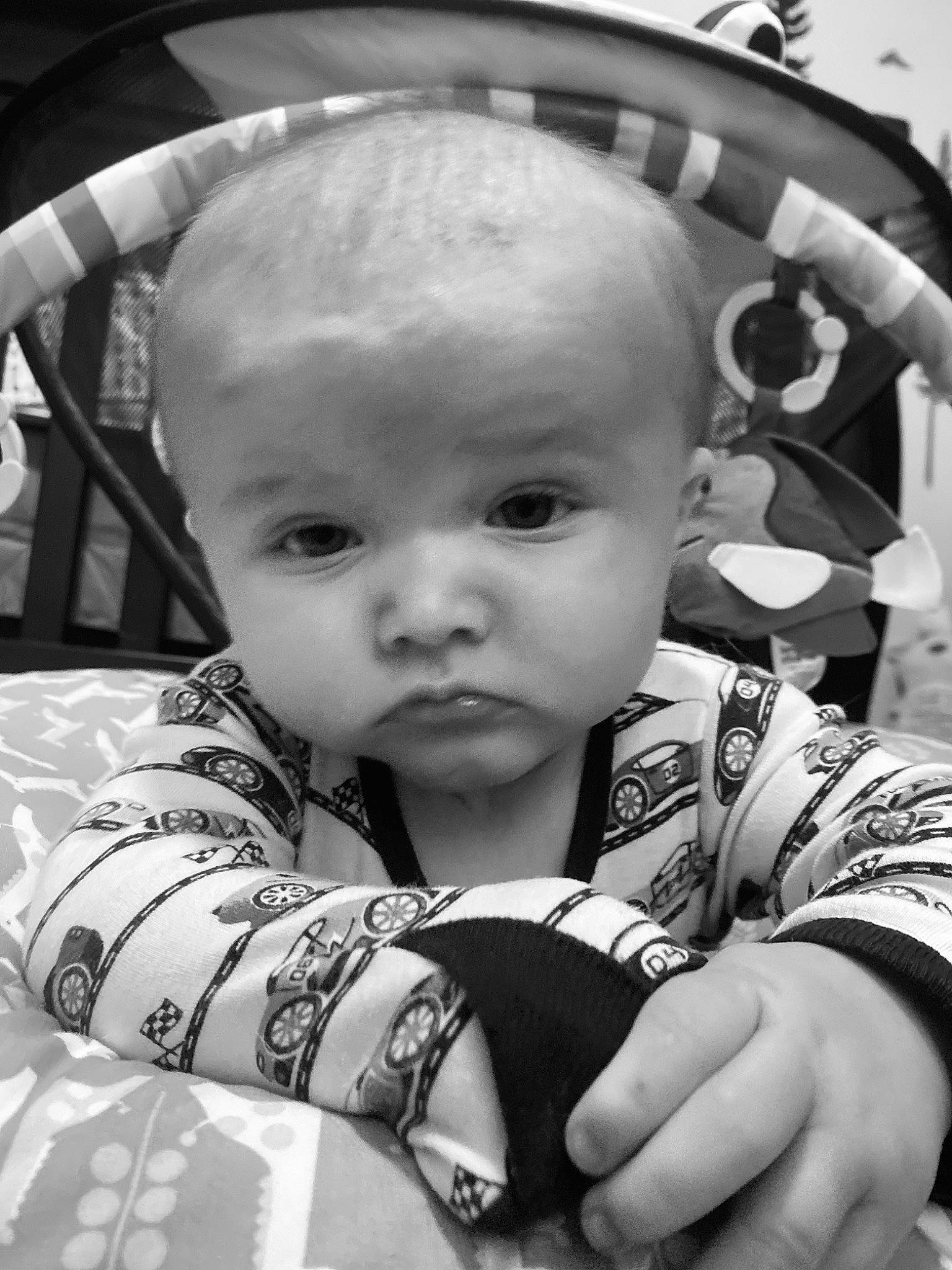 Paxton is registered to the contest to win money with this photo: baby, baby_toddler_clothing, black, black_and_white, cheek, child, fun, hairstyle, hand, happy, human, iris, monochrome, monochrome_photography, people, person, photograph, skin, snapshot, style