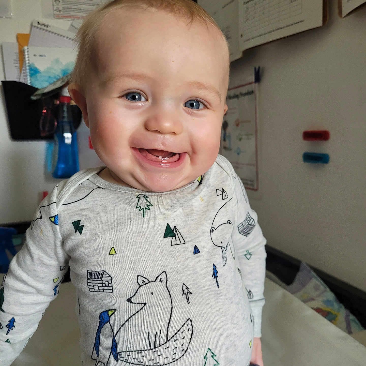 Cayson joined the competition — help win amazing prizes! baby, babylaughing, bodypart, clothing, face, finger, hand, happy, head, laughing, longsleeve, mouth, person, photography, portrait, sitting, sleeve, smile, t_shirt, whiteboard