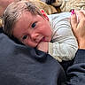 Theo joined the competition — help win amazing prizes! adult, baby, closeup, clothing, cushion, face, hair, hand, holding, indoor, infant, manicure, nail_polish, person, pillow, portrait, resting, skin, soft_lighting, window