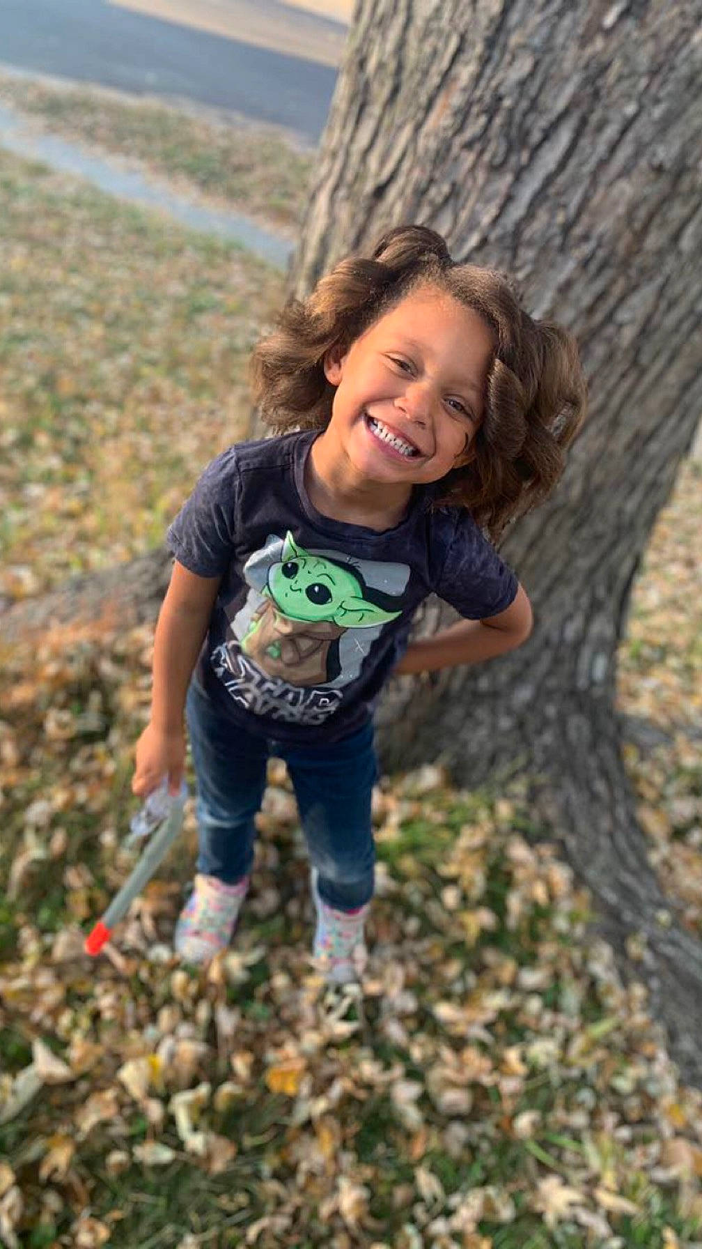 Samira joined the competition — help win amazing prizes! child, deciduous, forest, fun, grass, happy, joy, leisure, people_in_nature, person, play, recreation, smile, soil, spring, t_shirt, toddler, tree, trunk, wood