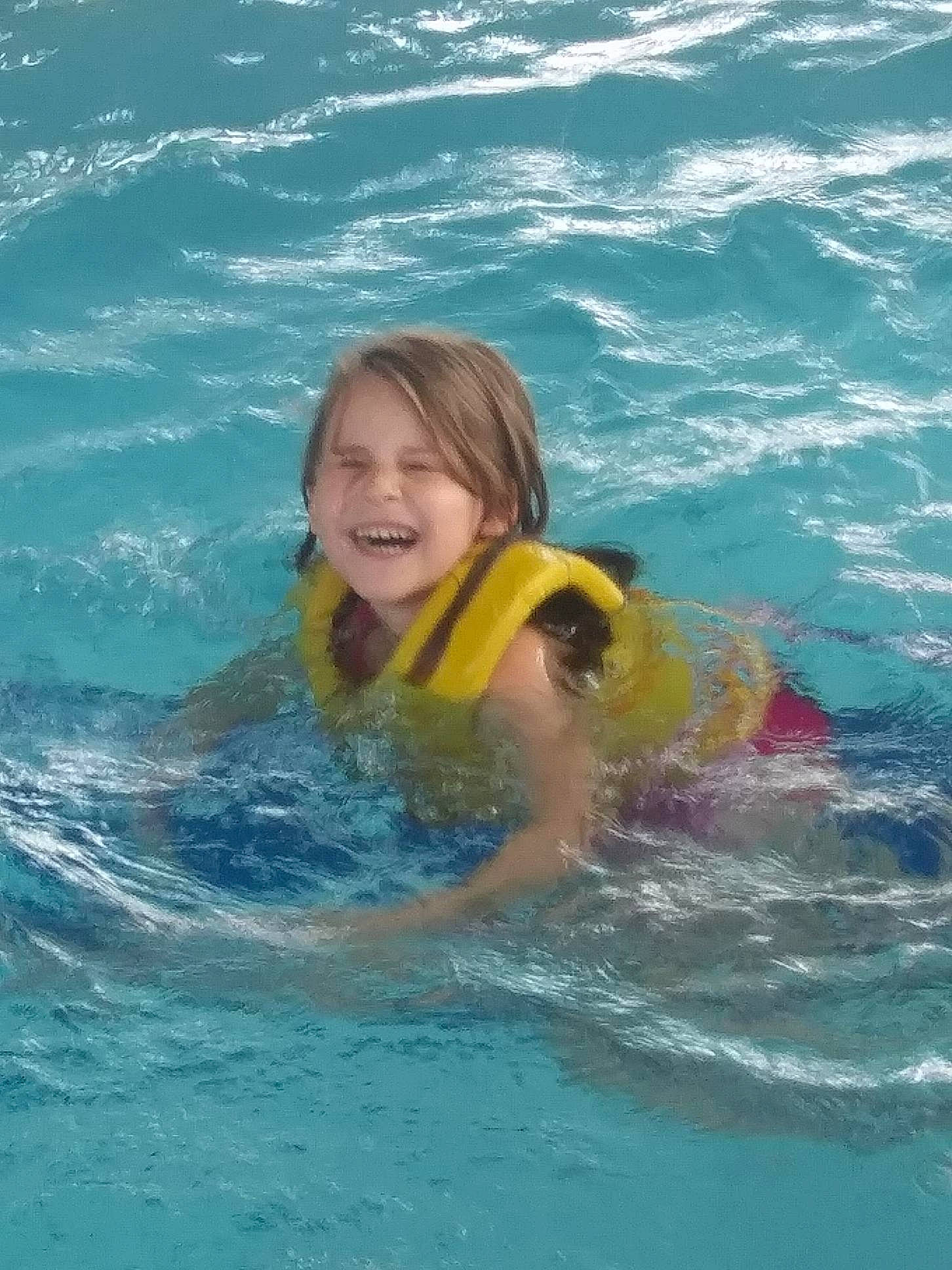 Sabrina is registered to the contest to win money with this photo: fun, individual_sports, joy, leisure, person, recreation, sports, swimmer, swimming, swimming_pool, vacation, water_sport