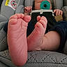 baby, infant, feet, pacifier, car_seat, child, seatbelt, comfort, close_up, cute, skin, foot, toes, clothing, safety, resting, indoors, newborn, child_seat, baby_gear