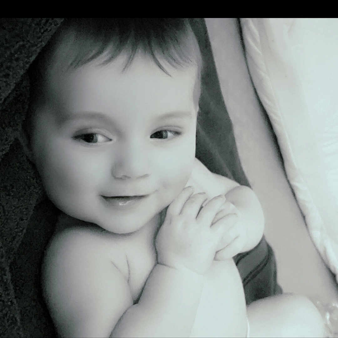 Phoenix-Rose is registered to the contest to win money with this photo: baby, bed, bedroom, bodypart, cushion, face, finger, furniture, hand, happy, head, homedecor, indoors, laughing, newborn, person, photography, portrait, room, smile