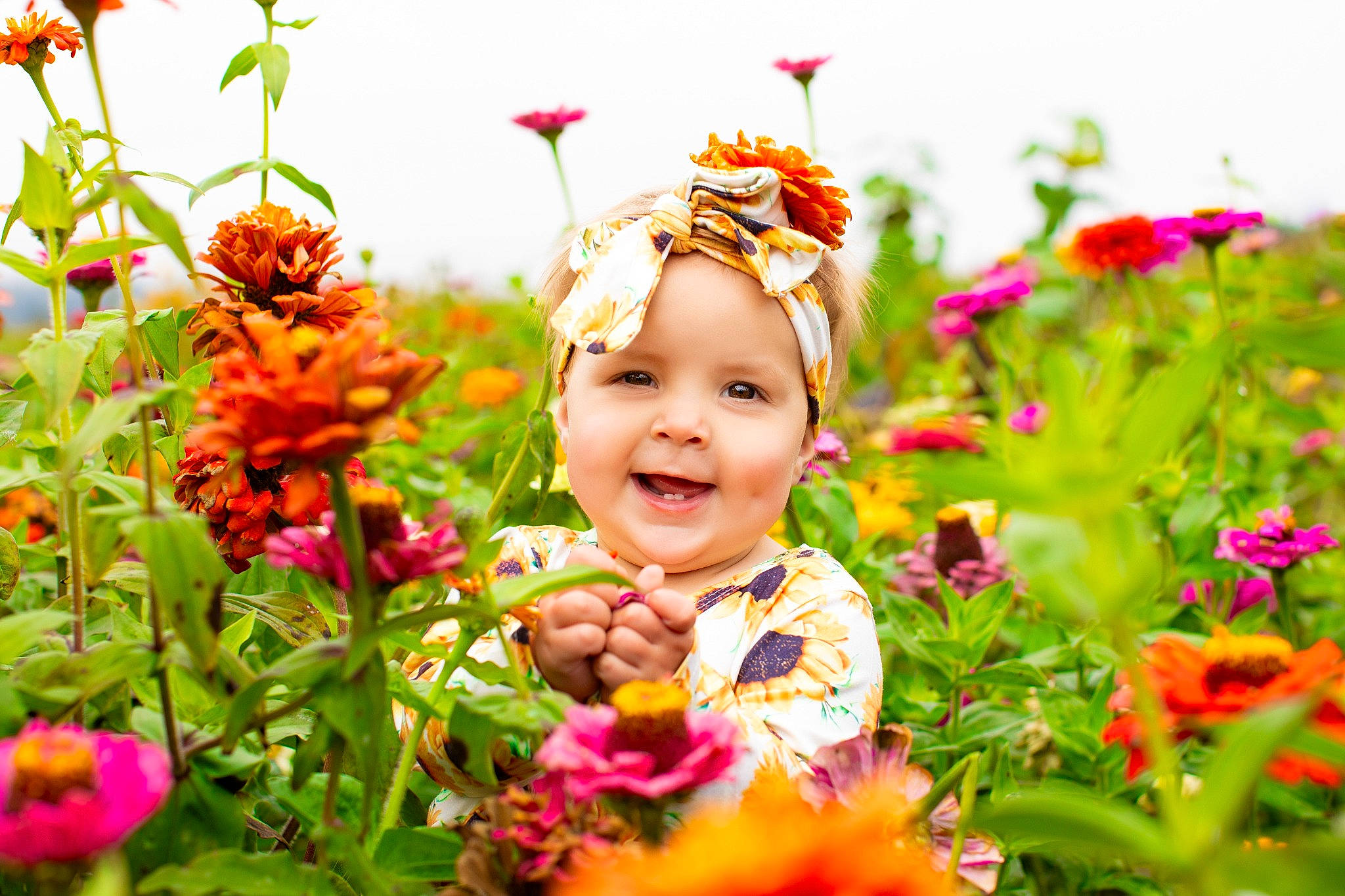 Raylee joined the competition — help win amazing prizes! baby, botany, eye, face, flower, flowering_plant, grass, happy, headwear, joy, leaf, magenta, nature, people_in_nature, person, petal, photograph, pink, plant, smile