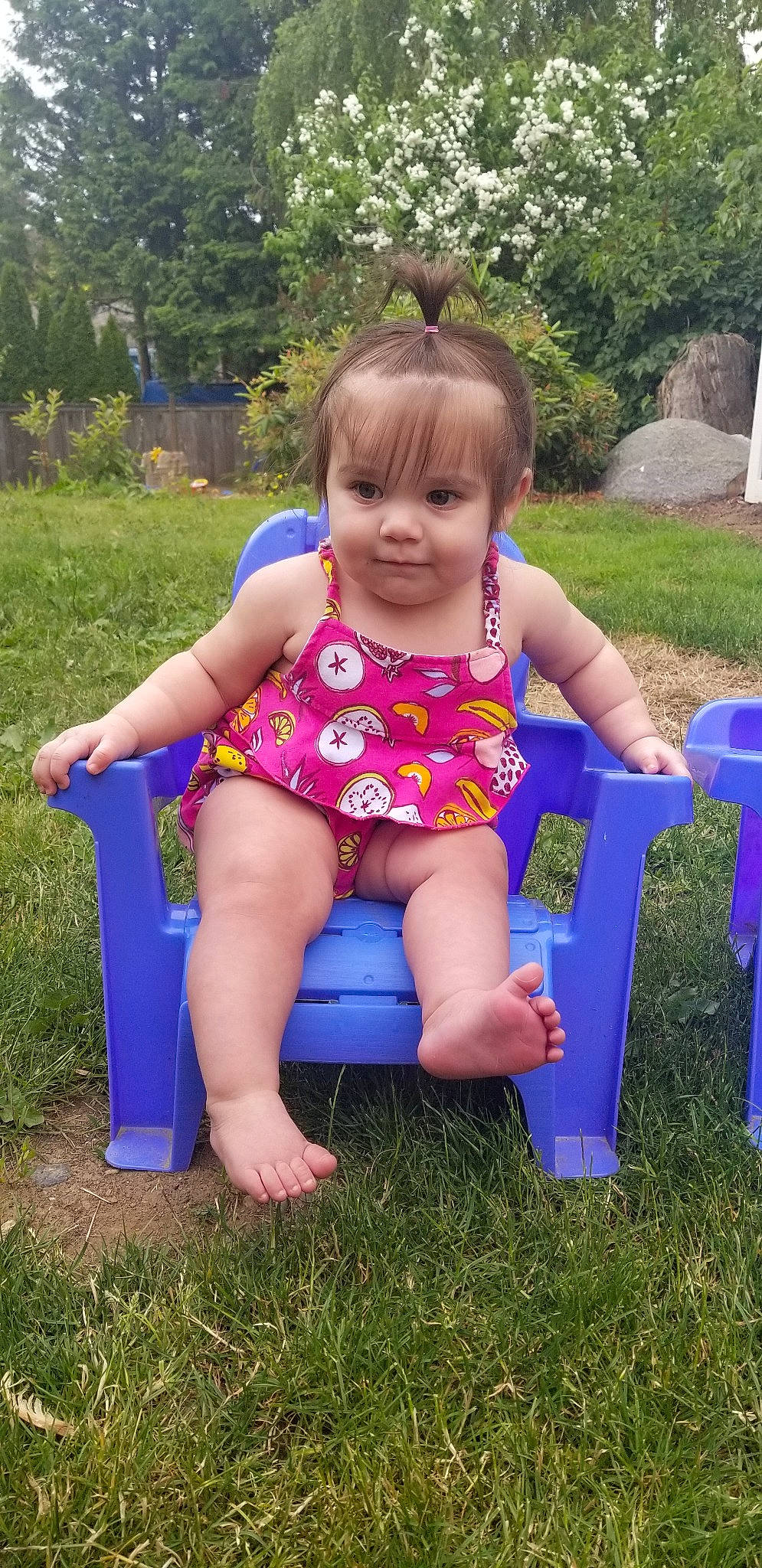 Erika joined the competition — help win amazing prizes! barefoot, child, fun, furniture, grass, leg, leisure, person, play, sitting, smile, summer, toddler, vacation