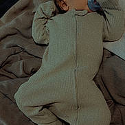 Kaizen joined the competition — help win amazing prizes! baby, sleeping, pacifier, blanket, knitwear, infant, cozy, soft_texture, bed, child, newborn, comfort, peaceful, face, footed_pajamas, rest, warm, indoors, person, sleep