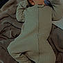 baby, sleeping, pacifier, blanket, knitwear, infant, cozy, soft_texture, bed, child, newborn, comfort, peaceful, face, footed_pajamas, rest, warm, indoors, person, sleep