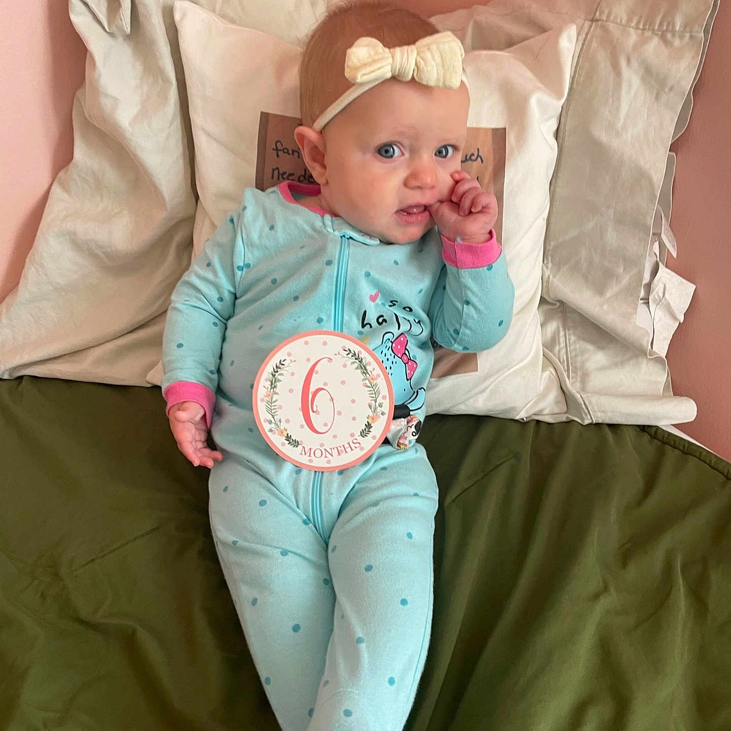 Elisa joined the competition — help win amazing prizes! baby, bed, bedroom, clothing, couch, cushion, face, furniture, hat, head, homedecor, indoors, pajamas, pants, person, photography, pillow, portrait, room, sitting