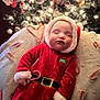 Kade joined the competition — help win amazing prizes! baby, infant, christmas, santa_suit, candy_cane, christmas_tree, ornament, lights, sleeping, cozy, blanket, holiday, festive, portrait, red_costume, hat, bokeh, indoor, cute, seasonal_decor