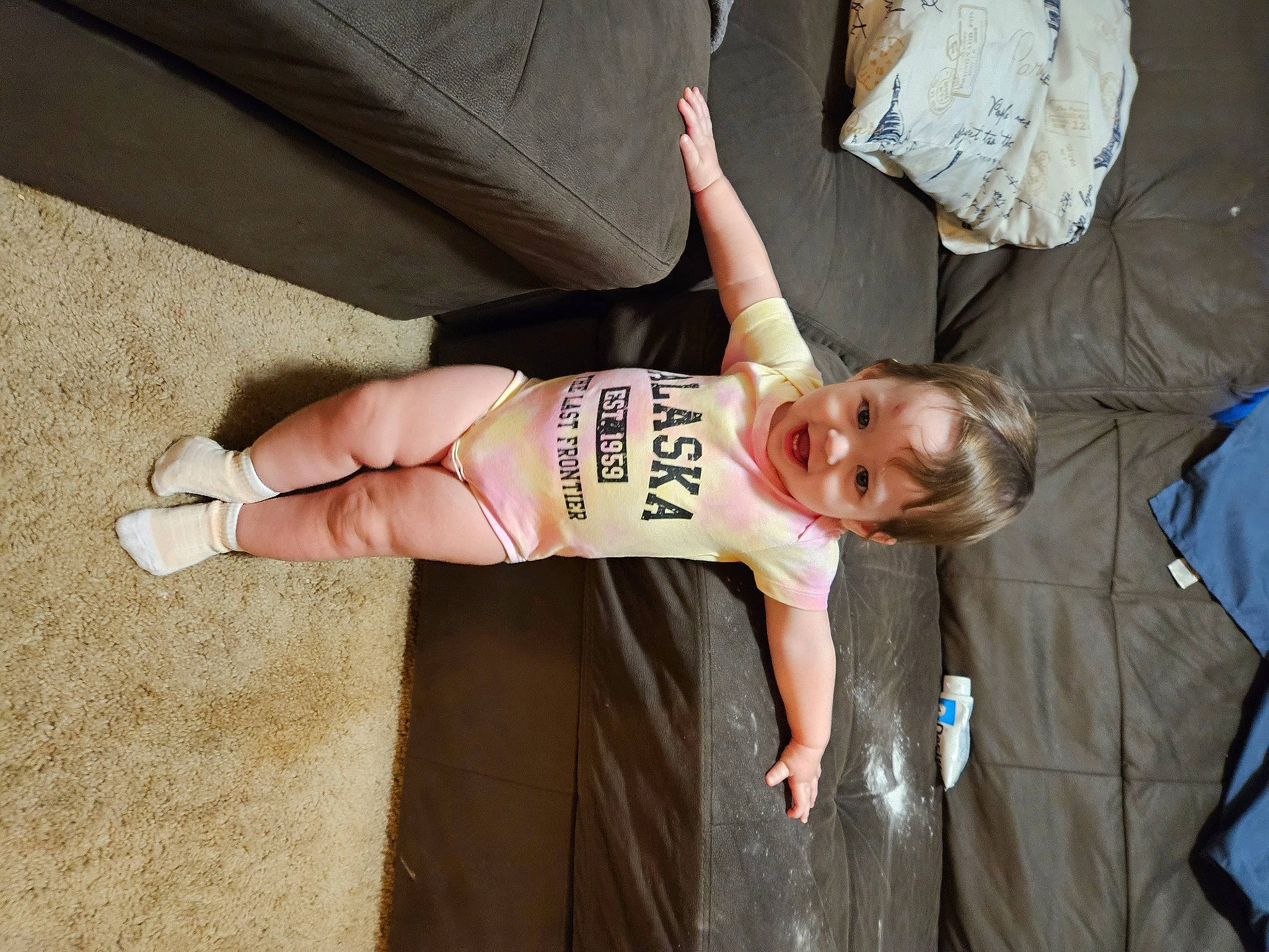 Tracy is registered to the contest to win money with this photo: abdomen, chest, elbow, finger, foot, fun, gesture, happy, human_leg, joint, knee, person, shorts, sportswear, t_shirt, thigh, tree, trunk, waist, wood