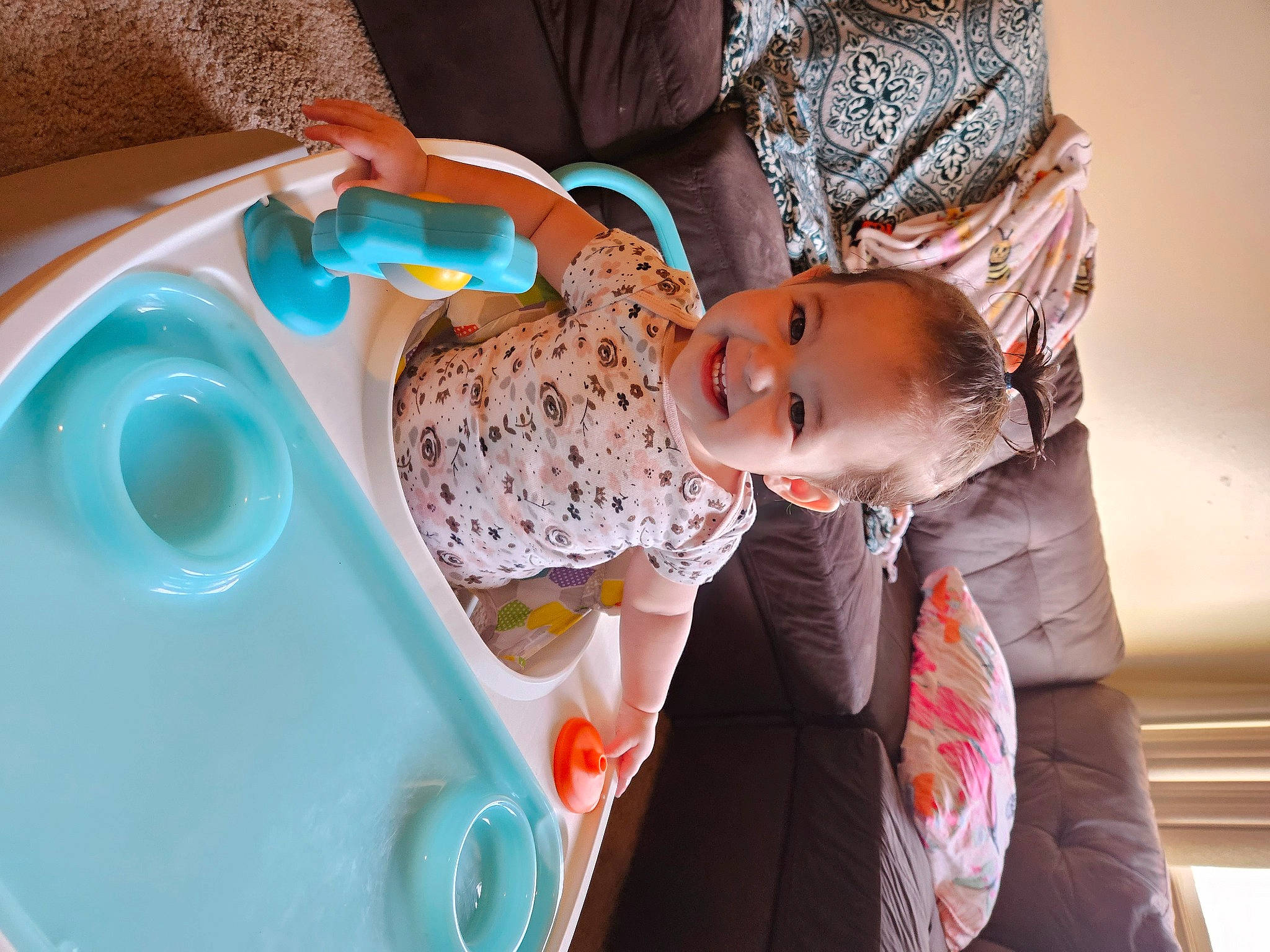 Tracy is registered to the contest to win money with this photo: baby, baby_products, baby_toddler_clothing, bathing, blue, child, comfort, event, fun, happy, hat, joy, leisure, person, pink, play, room, smile, toddler, tree