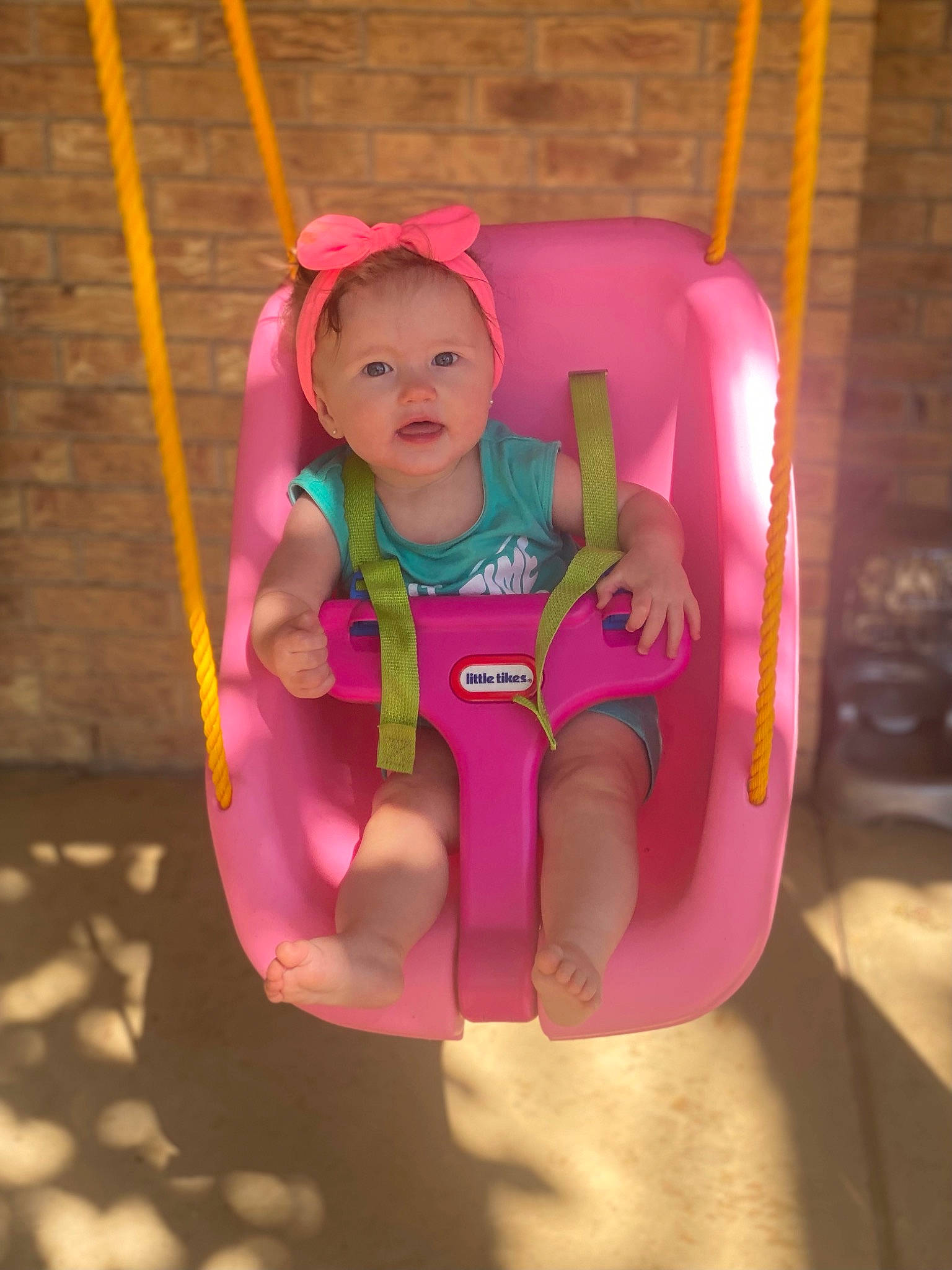 Alexis is registered to the contest to win money with this photo: baby, baby_products, baby_toddler_clothing, baby_toys, cheek, child, comfort, fun, happy, leisure, magenta, outdoor_play_equipment, person, pink, purple, recreation, sitting, swing, thigh, toddler