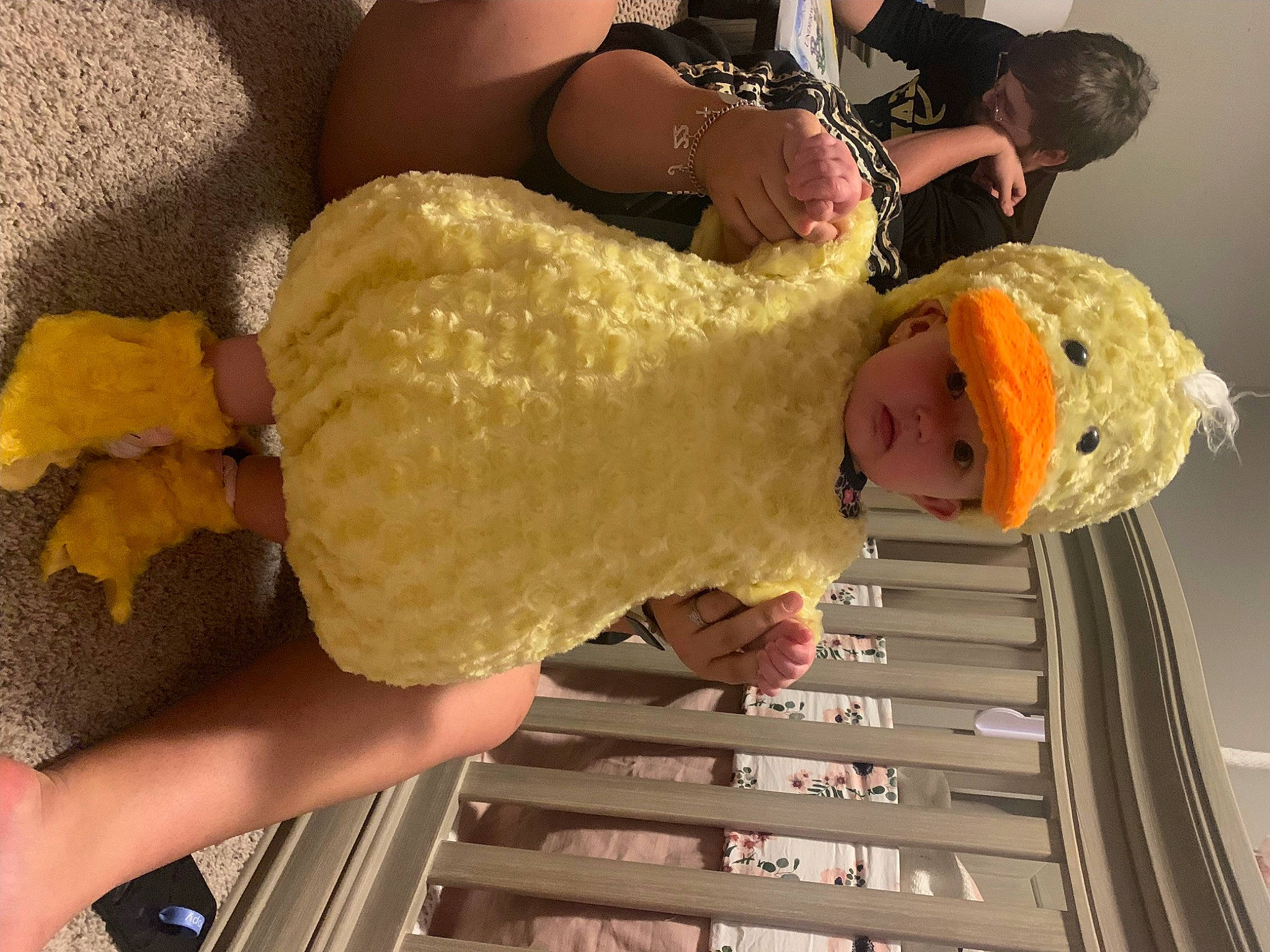 Alexis is registered to the contest to win money with this photo: abdomen, baby, child, comfort_food, cuisine, food, hand, hat, headwear, jewellery, nail, pattern, peach, person, room, thumb, toddler, wood, wrist, yellow