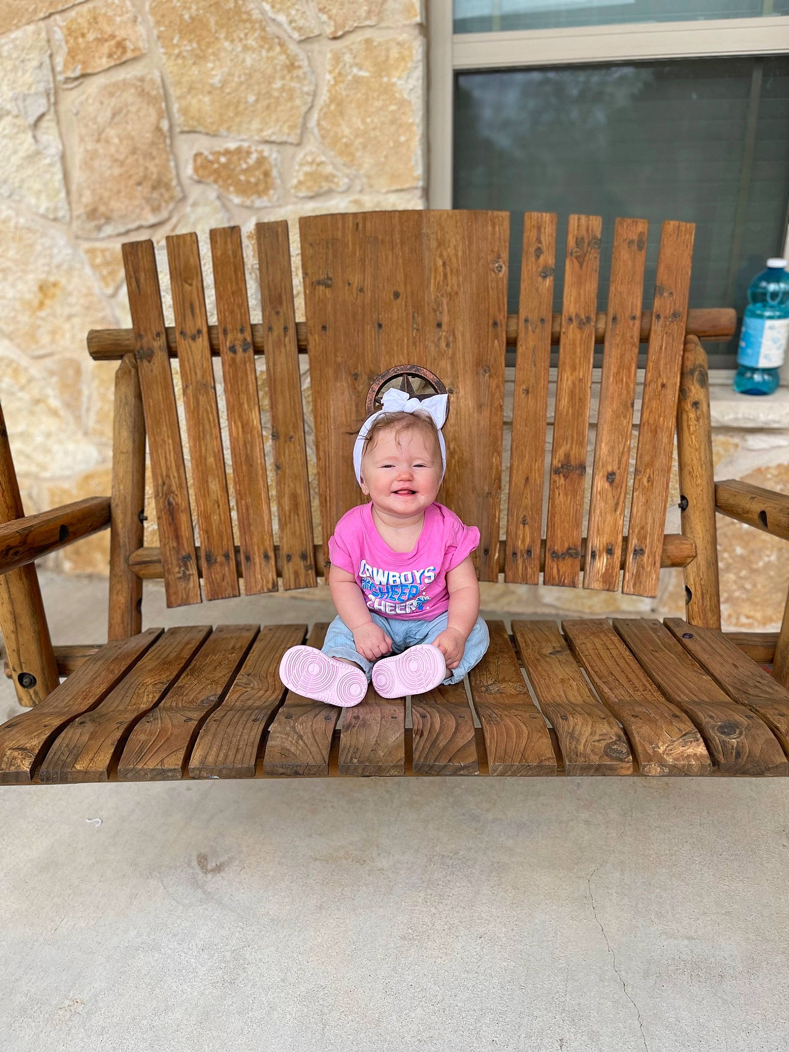 Alexis joined the competition — help win amazing prizes! baby_toddler_clothing, chair, child, deck, flooring, furniture, grass, happy, hardwood, hat, leisure, magenta, outdoor_furniture, person, plant, porch, recreation, t_shirt, toddler, wood