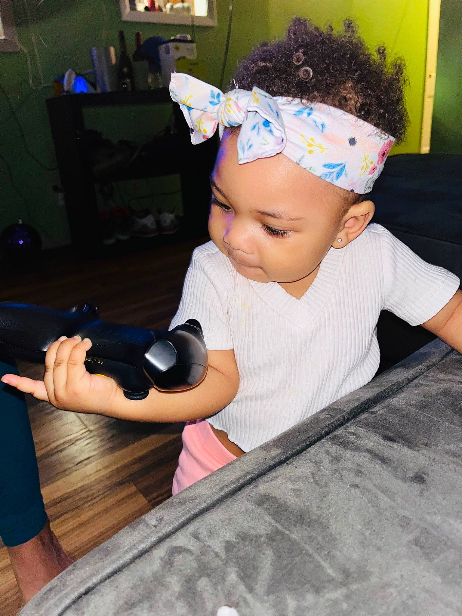 Jaliyah joined the competition — help win amazing prizes! baby, baby_toddler_clothing, camera, cap, child, cool, costume, electric_blue, eyewear, fashion_accessory, fun, happy, headband, headpiece, headwear, person, personal_protective_equipment, room, shorts, sitting