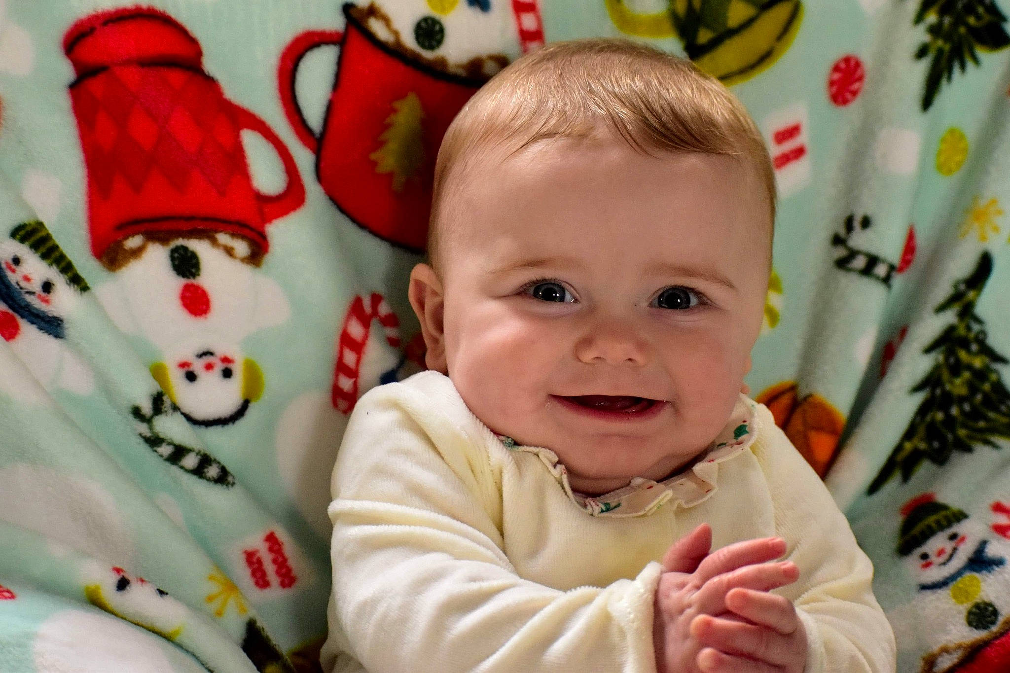 Adrienne is registered to the contest to win money with this photo: baby, baby_toddler_clothing, cheek, child, eye, face, facial_expression, fun, happy, head, iris, joy, organ, people, person, product, red, sleeve, smile, textile