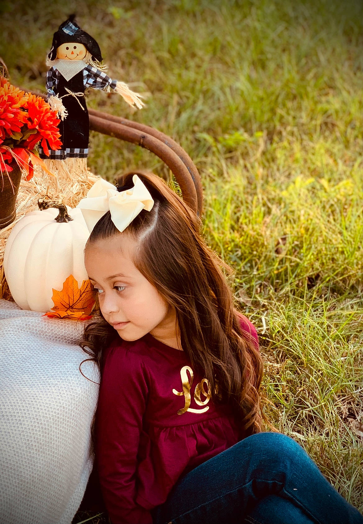 Leena joined the competition — help win amazing prizes! brown_hair, child, doll, dress, fawn, fun, grass, hairstyle, happy, leaf, leisure, long_hair, morning, people_in_nature, person, petal, plant, pumpkin, summer, toddler