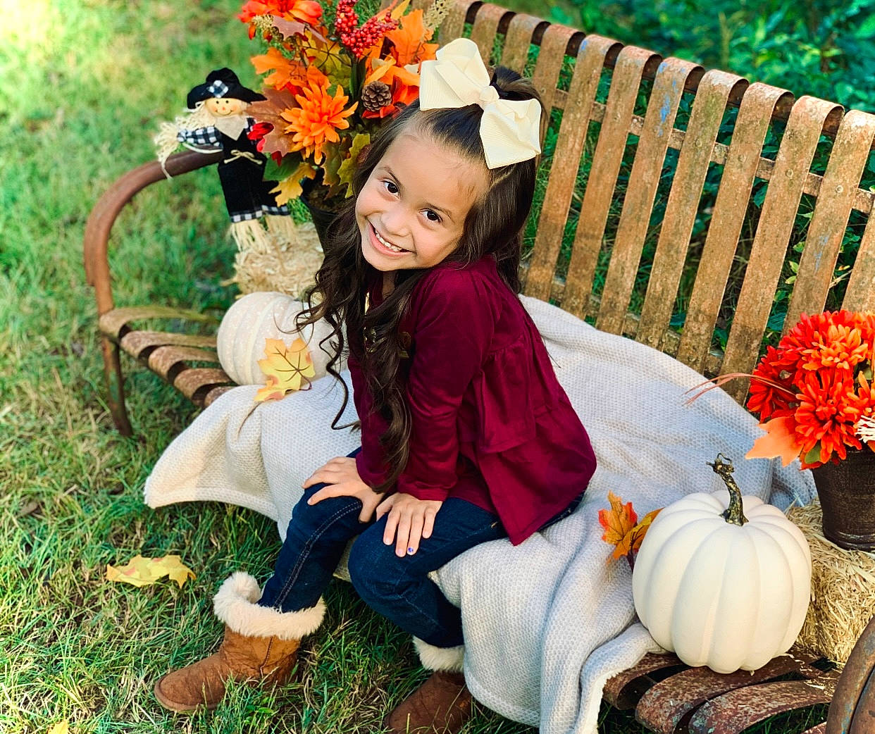 Leena is registered to the contest to win money with this photo: botany, calabaza, cucurbita, event, flower, gourd, grass, green, happy, joy, leisure, natural_foods, people_in_nature, person, plant, pumpkin, sitting, smile, squash, toddler