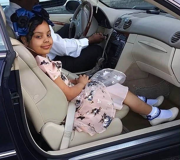 Makiyah is registered to the contest to win money with this photo: auto_part, automotive_design, automotive_exterior, automotive_lighting, automotive_wheel_system, beauty, car, car_seat, car_seat_cover, head_restraint, joy, mode_of_transport, motor_vehicle, person, personal_luxury_car, smile, steering_part, steering_wheel, thigh, vehicle