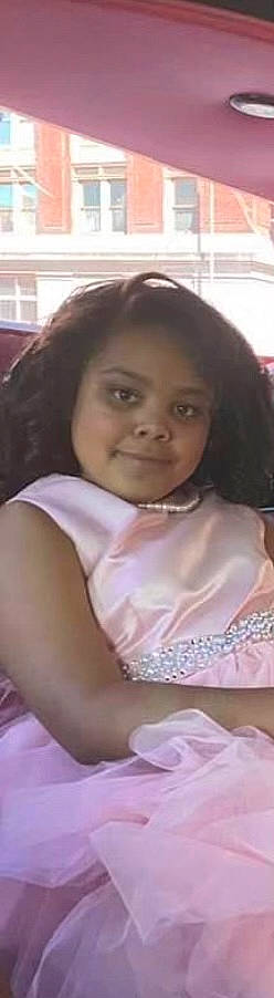 Makiyah joined the competition — help win amazing prizes! bangs, black_hair, brown_hair, cheek, chest, child, eyebrow, eyelash, forehead, formal_wear, fun, hair, hair_coloring, happy, joy, long_hair, nose, person, school_uniform, sitting