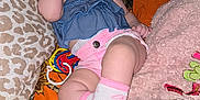 Amelia joined the competition — help win amazing prizes! baby, bed, clothing, couch, cushion, diaper, face, footwear, furniture, head, homedecor, hosiery, indoors, person, photography, portrait, shoe, shorts, sleeping, sock