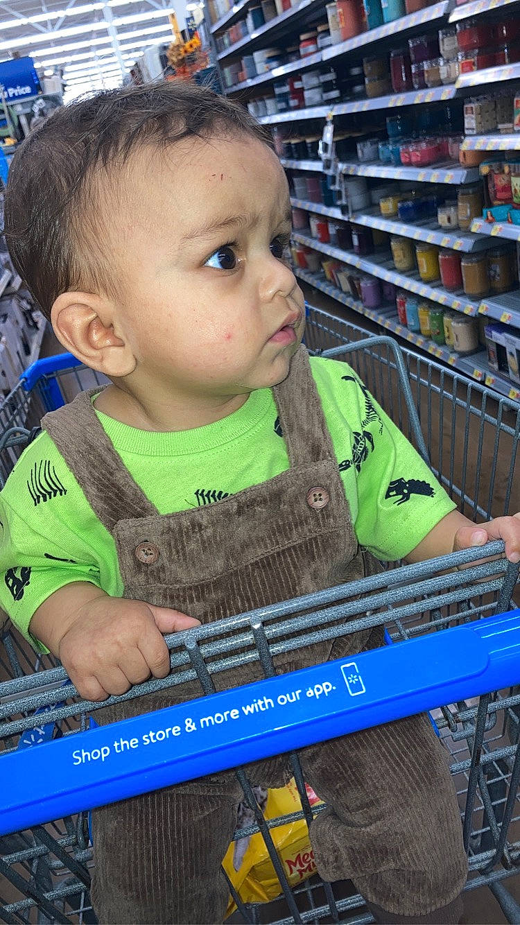 Malcolm joined the competition — help win amazing prizes! baby, blue, child, convenience_store, customer, electric_blue, fun, iris, keyboard, musical_instrument, organ, person, product, publication, retail, service, shelf, shelving, supermarket, t_shirt