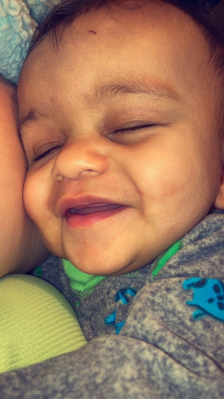 Malcolm is registered to the contest to win money with this photo: baby, blue, cheek, chin, cool, ear, eye, eyebrow, eyelash, finger, forehead, gesture, happy, iris, joy, lip, mouth, nose, organ, person