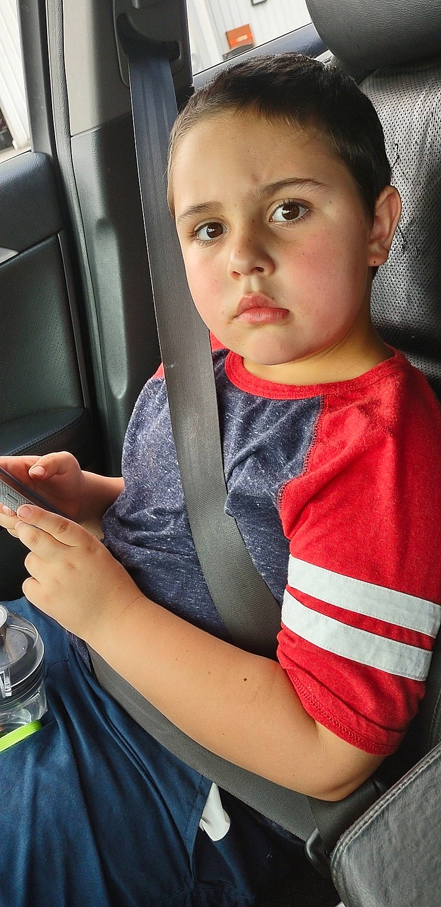 Kaiden joined the competition — help win amazing prizes! auto_part, automotive_design, automotive_lighting, baby, baby_toddler_clothing, car_seat, chin, dress, finger, lip, motor_vehicle, person, personal_luxury_car, sitting, skin, steering_wheel, t_shirt, toddler, vehicle_door, white