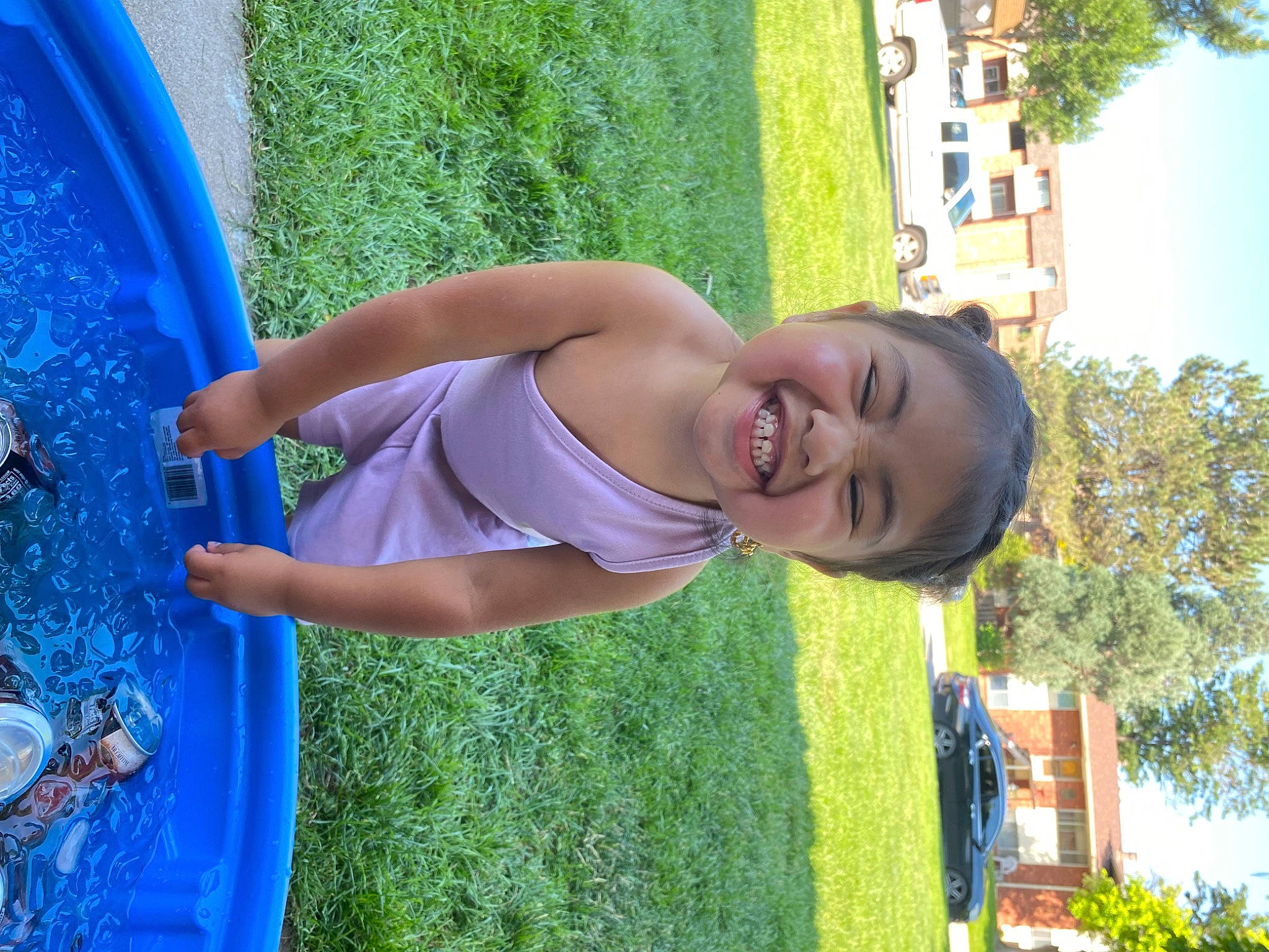 Vivianna is registered to the contest to win money with this photo: blue, child, electric_blue, fun, grass, green, happy, house, leisure, people_in_nature, person, plant, recreation, sky, smile, summer, toddler, tree, vehicle_door, water