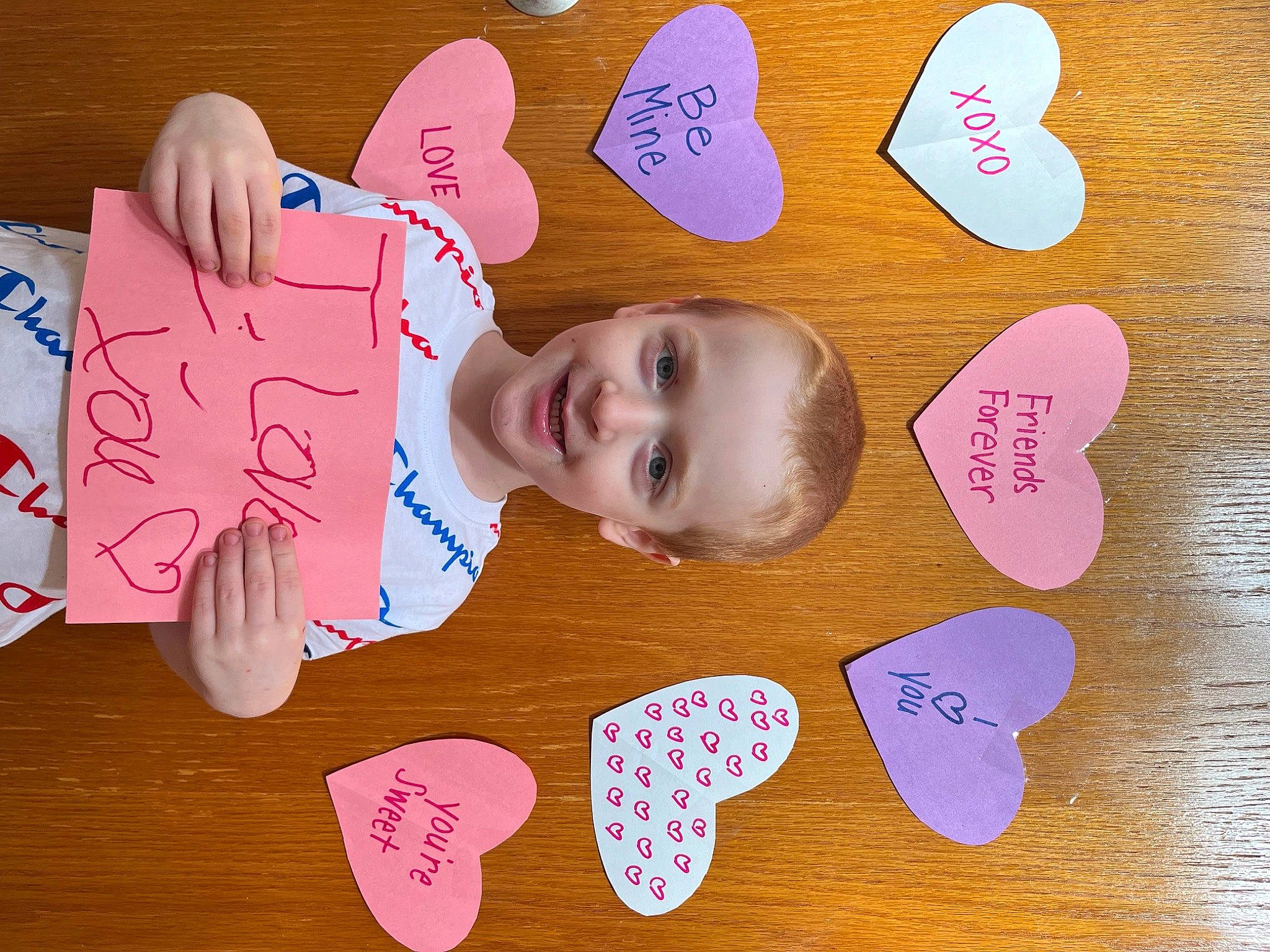 Julian joined the competition — help win amazing prizes! baby, baby_toddler_clothing, carmine, child, child_art, facial_expression, finger, font, guitar_accessory, handwriting, happy, joy, magenta, material_property, nail, organ, person, pink, red, smile