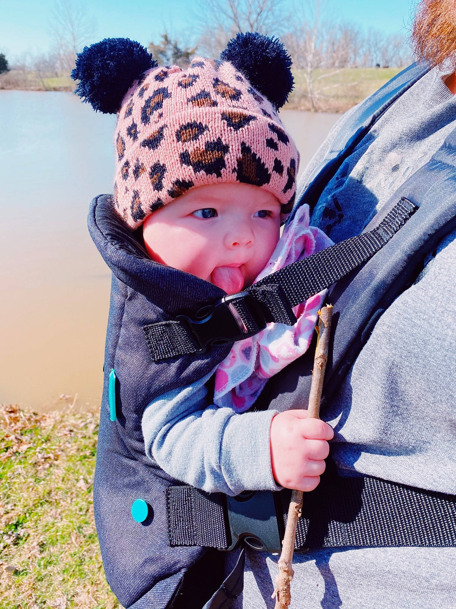 Aspyn joined the competition — help win amazing prizes! baby, baby_toddler_clothing, cap, electric_blue, face, freezing, fun, grass, grassland, happy, headwear, knit_cap, lake, leisure, outerwear, people_in_nature, person, personal_protective_equipment, plant, recreation