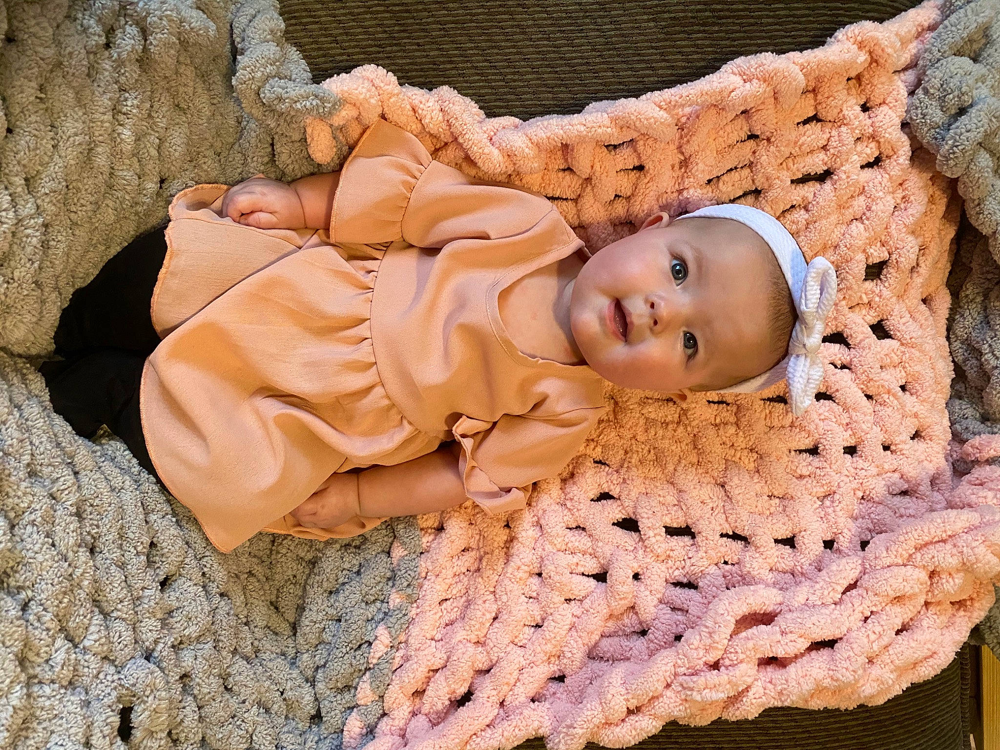 Aspyn is registered to the contest to win money with this photo: baby, baby_products, baby_sleeping, baby_toddler_clothing, cheek, child, comfort, eye, fashion_accessory, fawn, fur, grass, human_body, linens, pattern, person, sitting, skin, toddler, wood