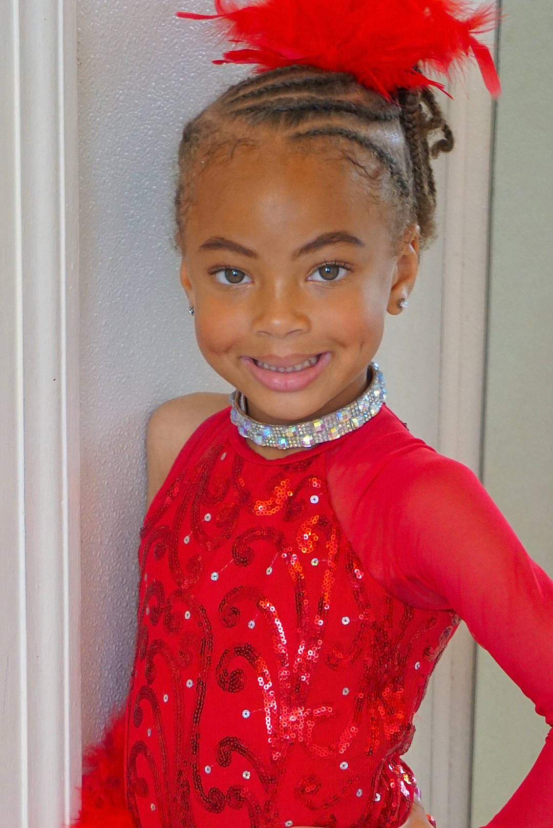 Aalaiyah is registered to the contest to win money with this photo: child_model, costume, fashion_accessory, hair, hair_accessory, joy, person, red