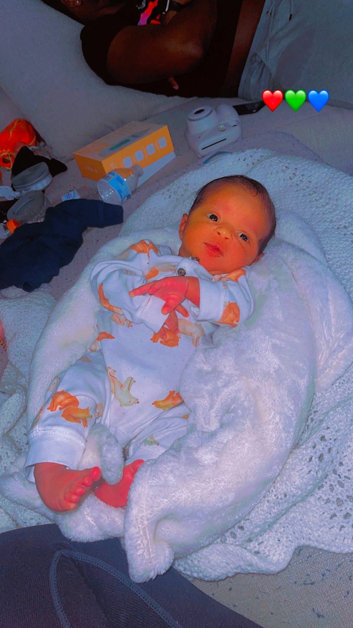 Arlo is registered to the contest to win money with this photo: baby, baby_products, baby_toddler_clothing, bedtime, cheek, child, comfort, face, linens, orange, person, room, toddler