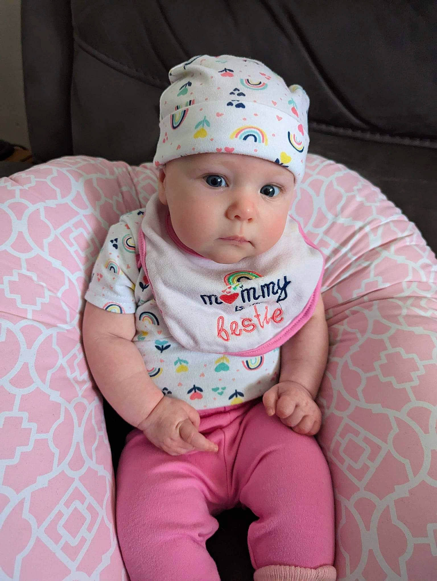Elizabeth joined the competition — help win amazing prizes! baby, baby_products, baby_toddler_clothing, cap, cheek, child, comfort, eye, face, fashion_accessory, fun, happy, head, headgear, headwear, magenta, pattern, person, pink, sitting