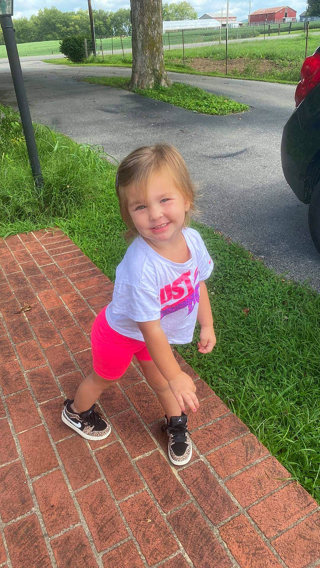 Oaklyn is registered to the contest to win money with this photo: asphalt, baby_toddler_clothing, beauty, child, fun, grass, grass_family, human_leg, joy, lawn, leisure, person, pink, plant, public_space, recreation, road_surface, sidewalk, snapshot, summer