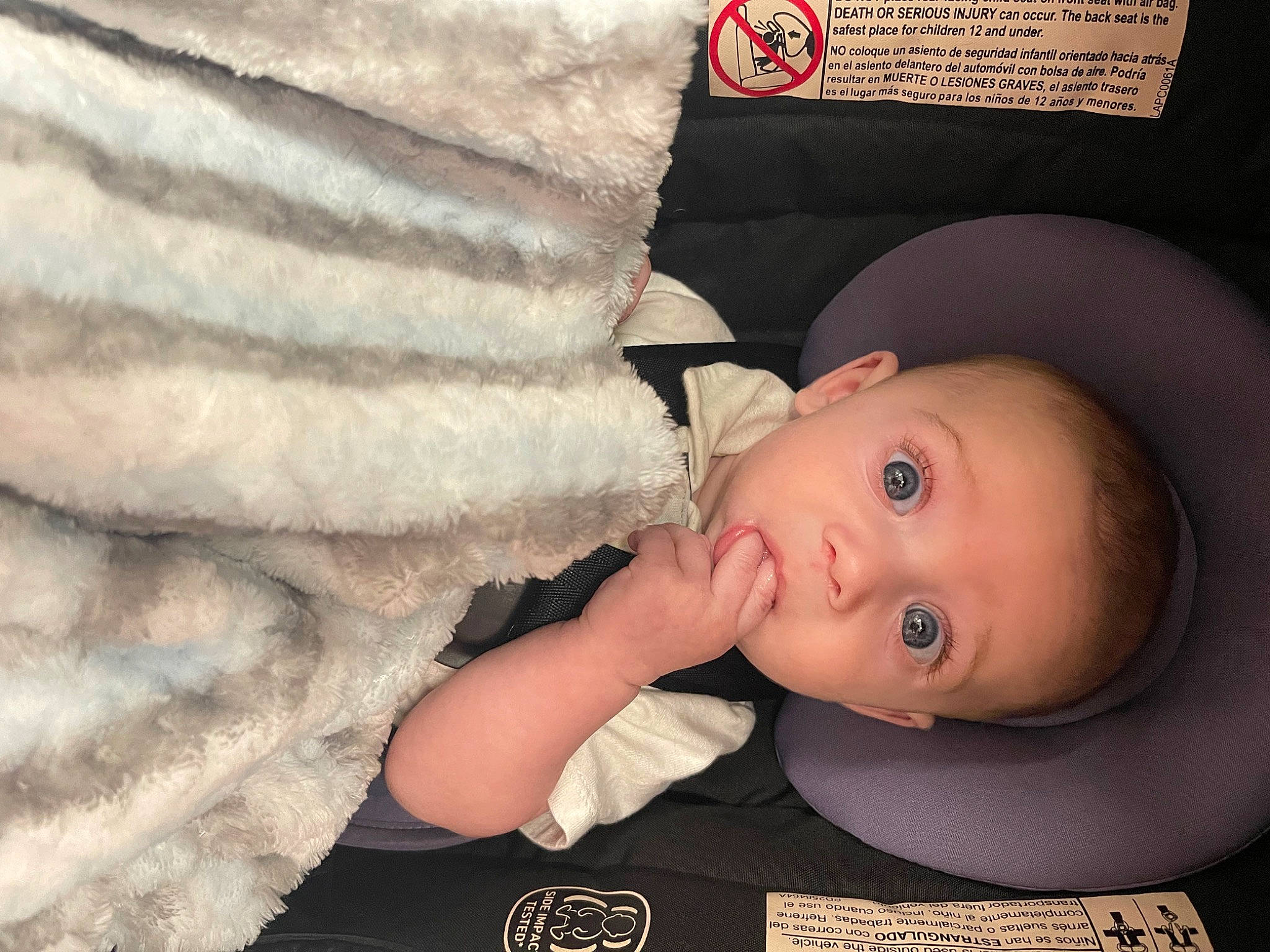 Carter is registered to the contest to win money with this photo: baby, baby_products, baby_safety, baby_sleeping, baby_toddler_clothing, bedding, blanket, cheek, child, comfort, facial_expression, finger, fur, infant_bed, linens, nose, pattern, person, room, skin