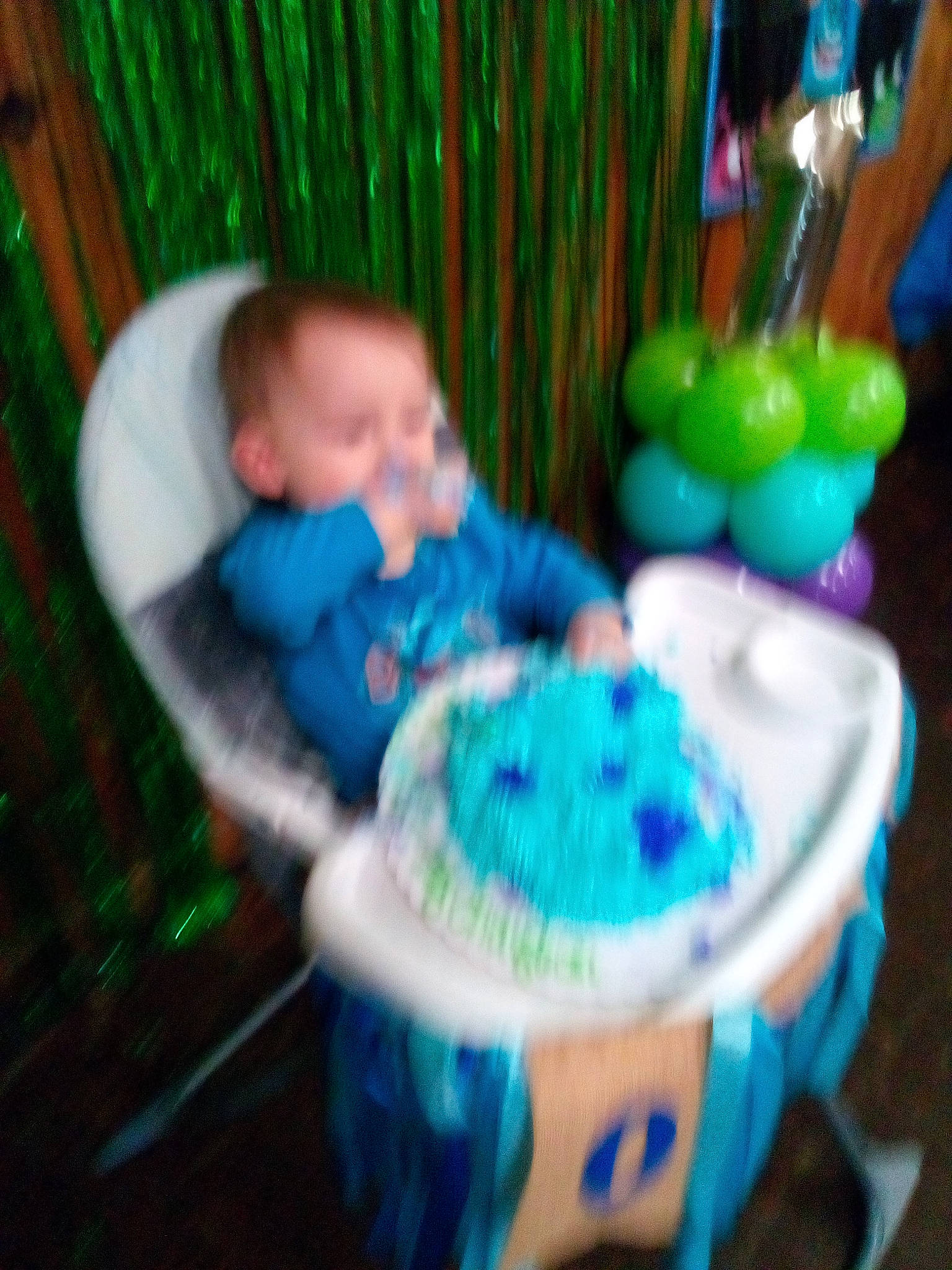 Chayton is registered to the contest to win money with this photo: baby, balloon, birthday, chair, child, dessert, drum, electric_blue, event, food, fun, icing, leisure, party, party_supply, person, play, sitting, sweetness, toddler